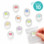 Ten clear round gel beads with colorful cartoon mouth faces, shown on a white background with a hand holding one in a small clear pouch and a teal 'PACK OF 10' badge in the top right.