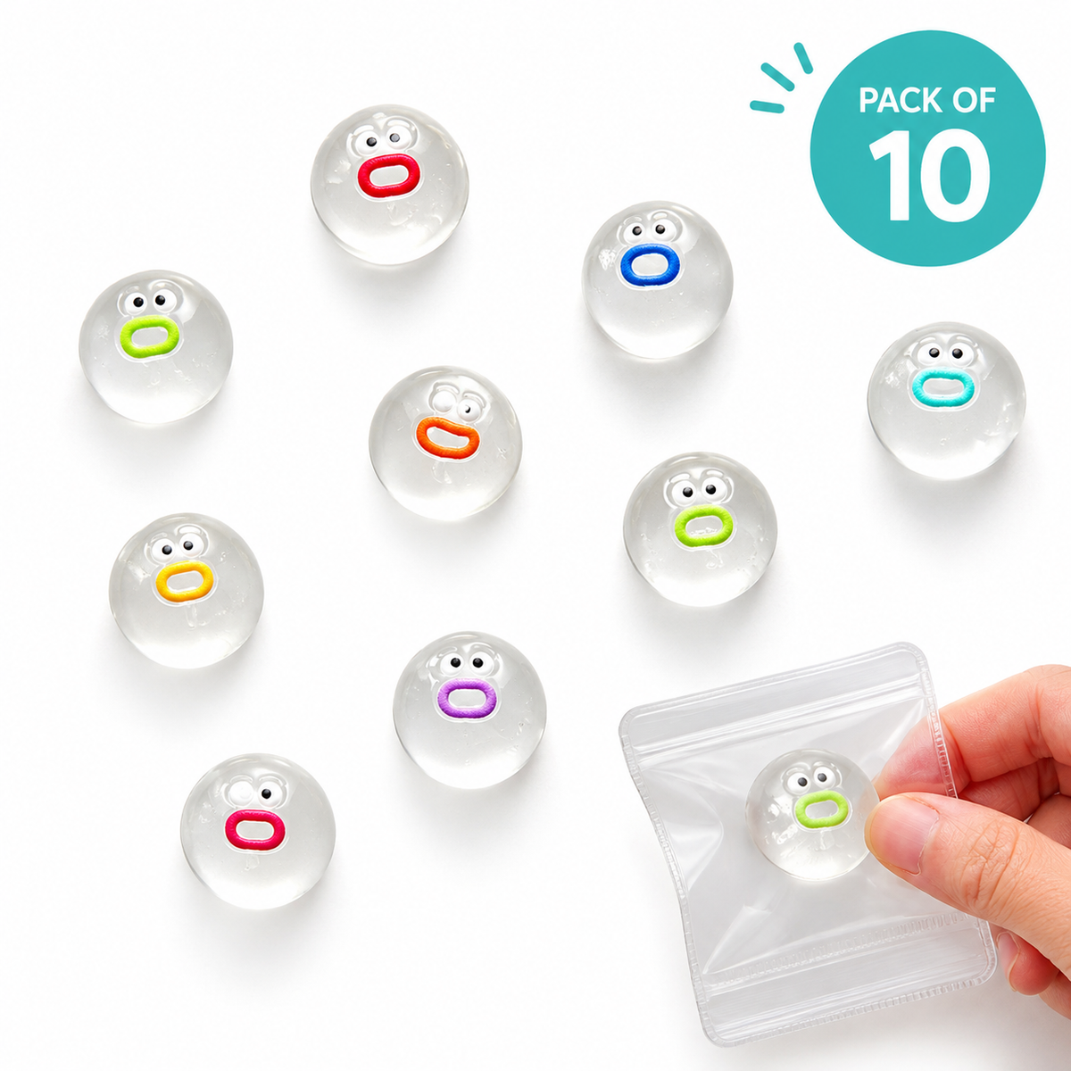 Ten clear round gel beads with colorful cartoon mouth faces, shown on a white background with a hand holding one in a small clear pouch and a teal 'PACK OF 10' badge in the top right.